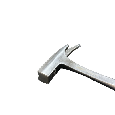 Ställningshammare med svart och oranget handtag